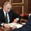 Президент России слушает доклад главы ЛУКОЙЛа